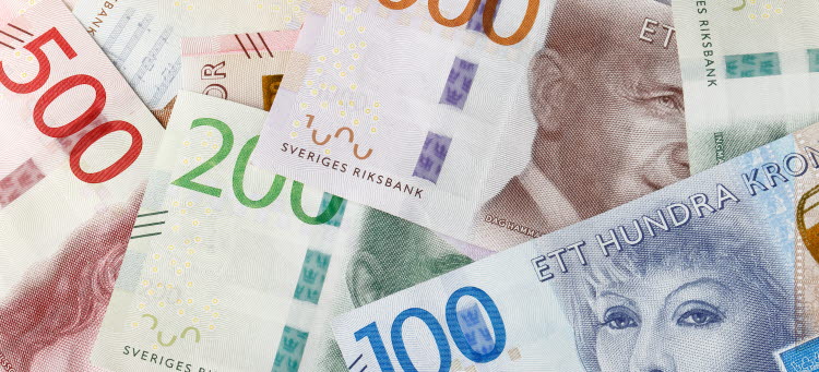 Svenska sedlar i olika valörer.